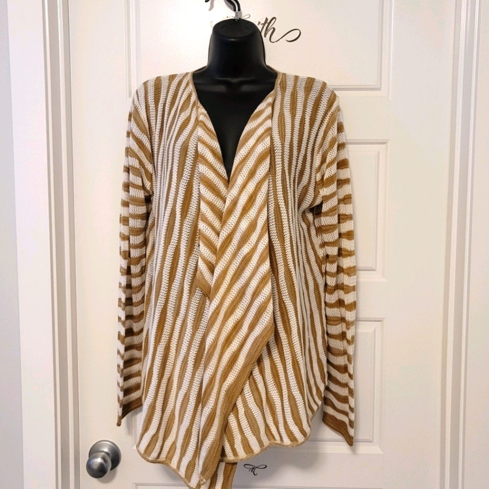 Cream and tan cardigan.